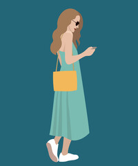 Woman in blue dress with cellphone