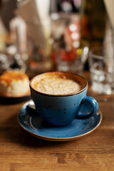 Beautiful cup of coffee on the table