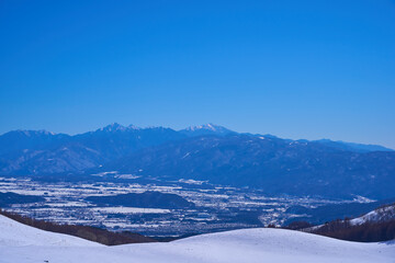 冬の霧ヶ峰高原から芽野市、南アルプス方面