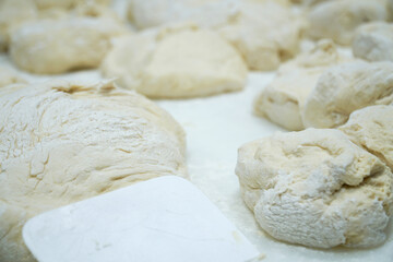 Fototapeta na wymiar master making dough for bread