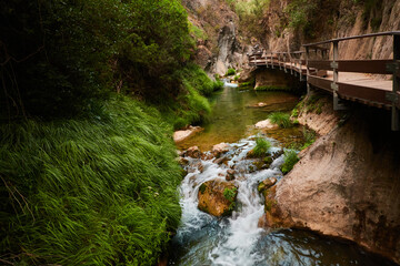 The Borosa river as it passes through the Elías ridge in the Sierra de Cazorla, Segura and Las Villas Natural Park. Jaen. Andalusia. Spain - obrazy, fototapety, plakaty