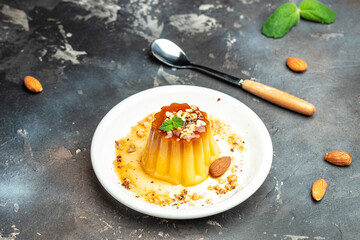 caramel panna cota. Creme Caramel Dessert on a dark background. banner, menu, recipe place for text, top view