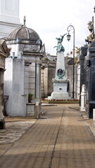 Tombs along an alley in La Recoleta Cemetery in Buenos Aires, Argentina