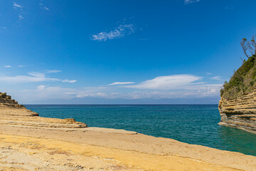 Fototapeta na wymiar The beach and coastline at Sidari on the island of Corfu.