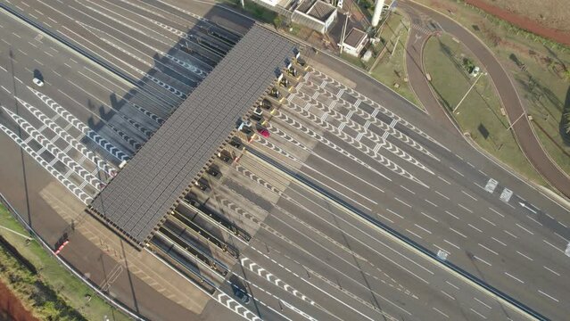 Ribeir&atilde;o Preto, S&atilde;o Paulo / Brazil - Circa June 2022: Highway toll plaza and speed limit with aerial image, view of automatic payment lanes, non-stop.