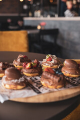 Gourmet donuts & bread at a boutique bakery shop.