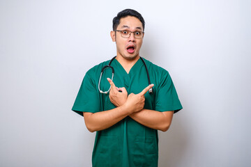 Indecisive and clueless asian male doctor, dont know what choose, pointing fingers sideways and...
