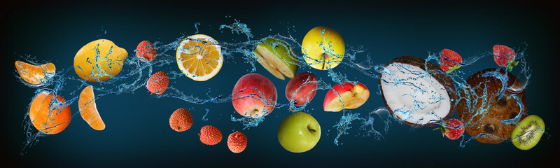 Fototapeta na wymiar Panorama with fruits in water - kiwi, coconut, strawberry, apple, lemon, lychee, tangerine - the best holiday treat