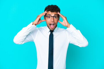 Young business Brazilian man isolated on blue background with surprise expression