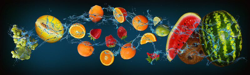 Fototapeta na wymiar Panorama with fruits in water - watermelon, coconut, currant, lime, orange, strawberry, melon, grapes strengthen the human immune system