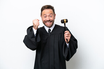 Naklejka premium Middle age judge man isolated on white background celebrating a victory in winner position