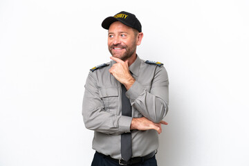 Middle age security man isolated on white background looking to the side