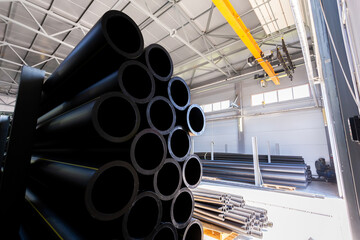 warehouse of plastic pipes in the factory
