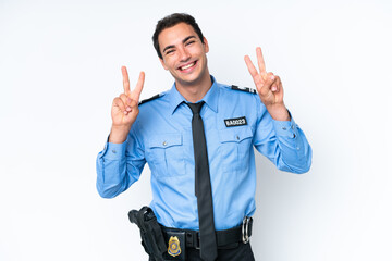 Young police caucasian man isolated on white background showing victory sign with both hands