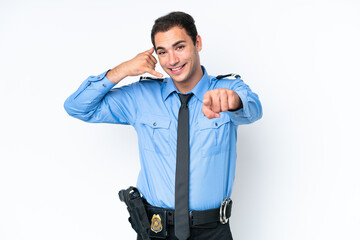 Fototapeta na wymiar Young police caucasian man isolated on white background making phone gesture and pointing front