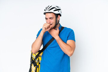 Young caucasian man with thermal backpack isolated on white background is suffering with cough and feeling bad