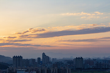 Fototapeta na wymiar Sunset aerial view of the cityscape of Wenshan District of Taipei from Xianjiyan
