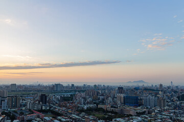 Naklejka na ściany i meble Sunset aerial view of the cityscape of Wenshan District of Taipei from Xianjiyan