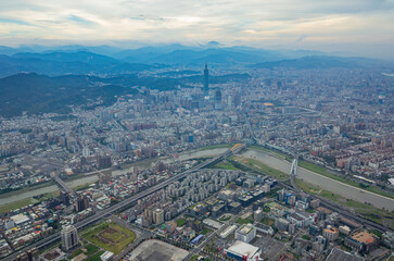 Fototapeta na wymiar Foggy aerial view of the Taipei cityscape