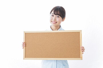 ボードを持つ看護師