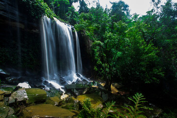 Jungle waterfall cascade in tropical rainforest.