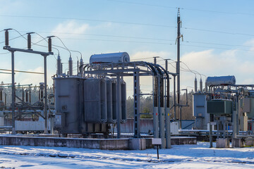 Obraz premium Electrical transformer, equipment for stepping up or stepping down voltage, high voltage power plant