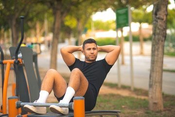 young man exercising in a park