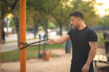 young man exercising in a park