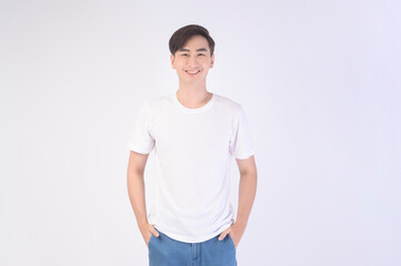 Portrait of young asian man over white background studio.