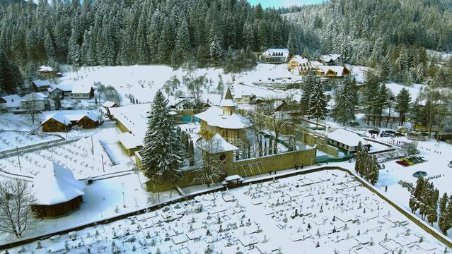 Aerial footage of medieval Voronet Monastery, located in Suceava county, Romania. Video was shot from a drone while flying towards the monastery, at a stable altitude with camera lowered.