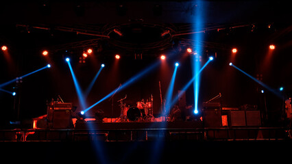 Fototapeta na wymiar Stage lighting beams spotlight and smoke of events show or concerts
