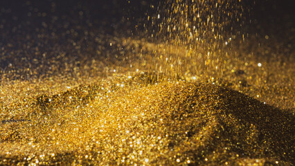 Sprinkle glitter gold dust sand in the dark textured abstract background elegant for Merry christmas and Happy new year