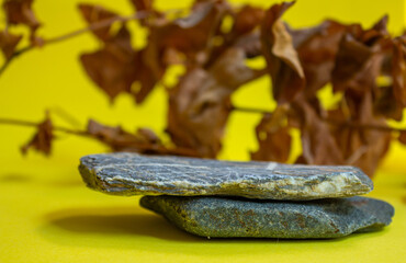 Stone podium or showcase. Presentation background for perfume and cosmetic products. Front view.