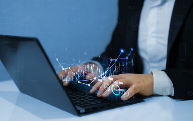 Stock market investment.Financial and banking Technology. Business person follow economic growth graph financial data on tablet. Business strategy and digital marketing. 