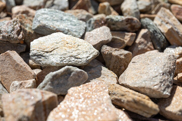 Decorative gravel close-up. Stone background for design on the construction theme, the theme of gardening, landscaping, garden architecture. Shallow depth of field.