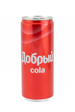 Krasnoyarsk, Russia - 15 September, 2022: Red can of fake Coca Cola under the Russian brand Dobry. Carbonated drink Dobry Cola analogue of Coca Cola. Isolated on white background