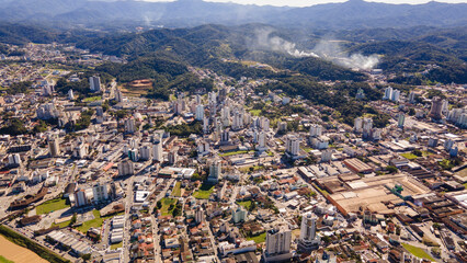 Aerial footage of the city of Brusque in Santa Catarina - obrazy, fototapety, plakaty