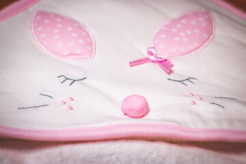 baby shoes on a pink background