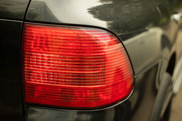 Rear car signal. Headlight machine. Transport details. Light source on road.