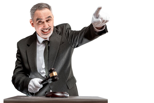Auctioneer, salesperson with gavel at public auction. Senior male barker in formal elegant suit with auction hammer for close the bidding