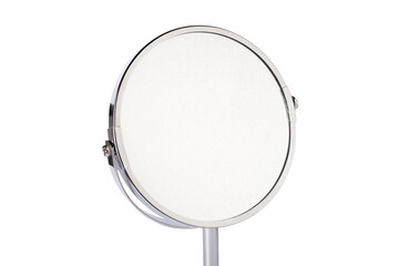 Desktop make up cosmetic mirror isolated on white background. Home metal mirror close up isolated. Facial mirror.