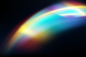 Rainbow highlights on a black background.Glare or reflection from water and glass.Glittering particles for social media backgrounds, product presentations, photo shots.
