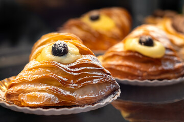 The famous sfogliatellla riccia (also called lobster tail in the US), a traditional shell-shaped, filled pastry from Naples, Italy.