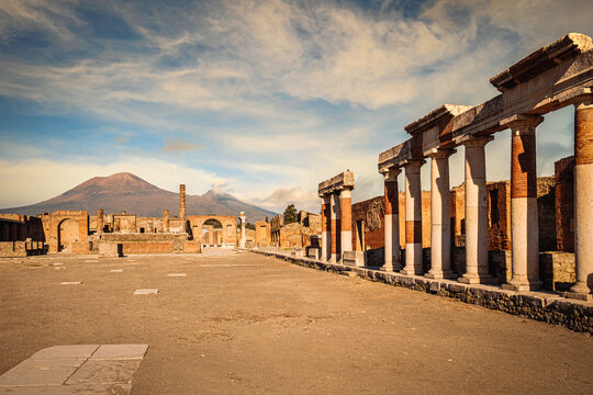 The Forum and volcano Vesuvius in the background, Pompei archeological site, Naples, Italy.