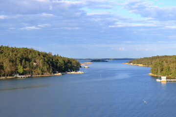 Beautiful scenery of natural environment of Turku archipelago surrounded with the greenery of pine...
