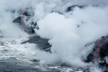 The lava glow of magma flowing in the ocean, Volcanic National Park Hawaii