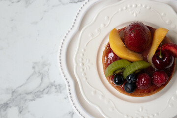 Close up Danish Fruit Tart on white background
