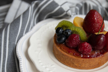 Close up Danish Fruit Tart on white background