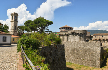 View of the old town with the fortress (13-15th centuries) in summer, Sarzana, La Spezia, Liguria, Italy