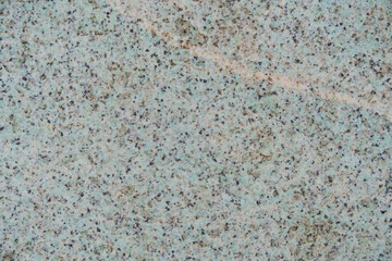 Texture and background granite stone greenish color.